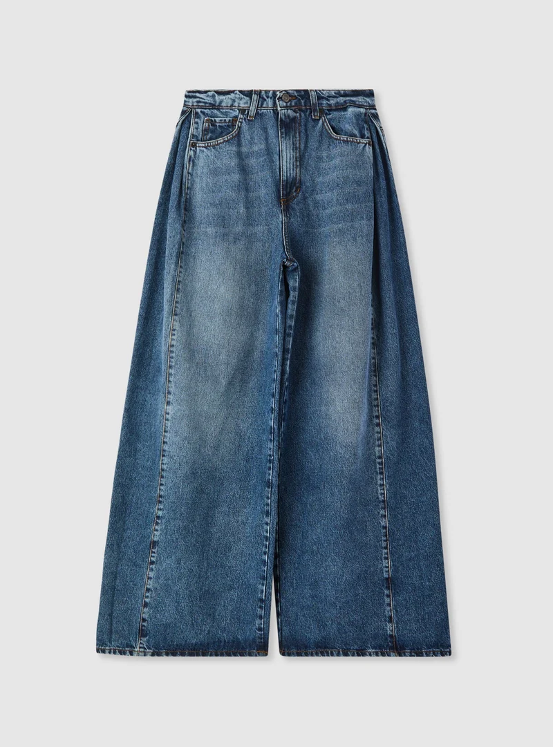 Jeans super wide leg con tagli laterali