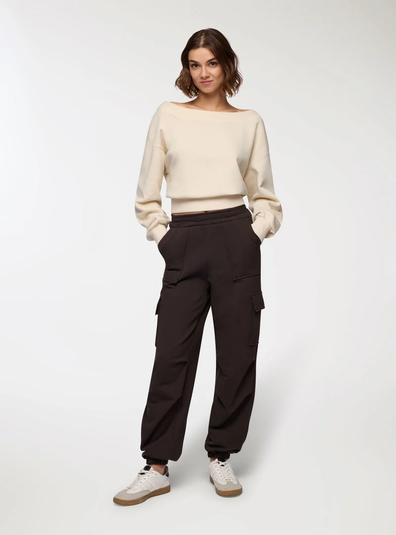 Pantaloni tuta cargo tinta unita