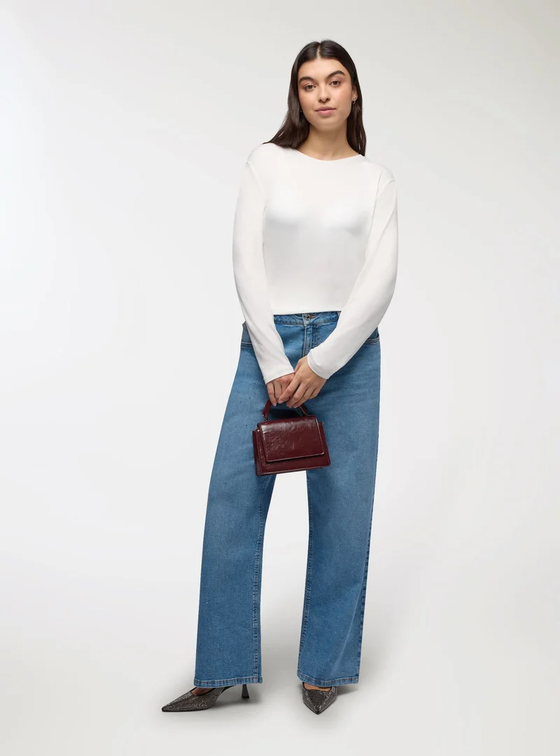 Jeans wide leg con strass