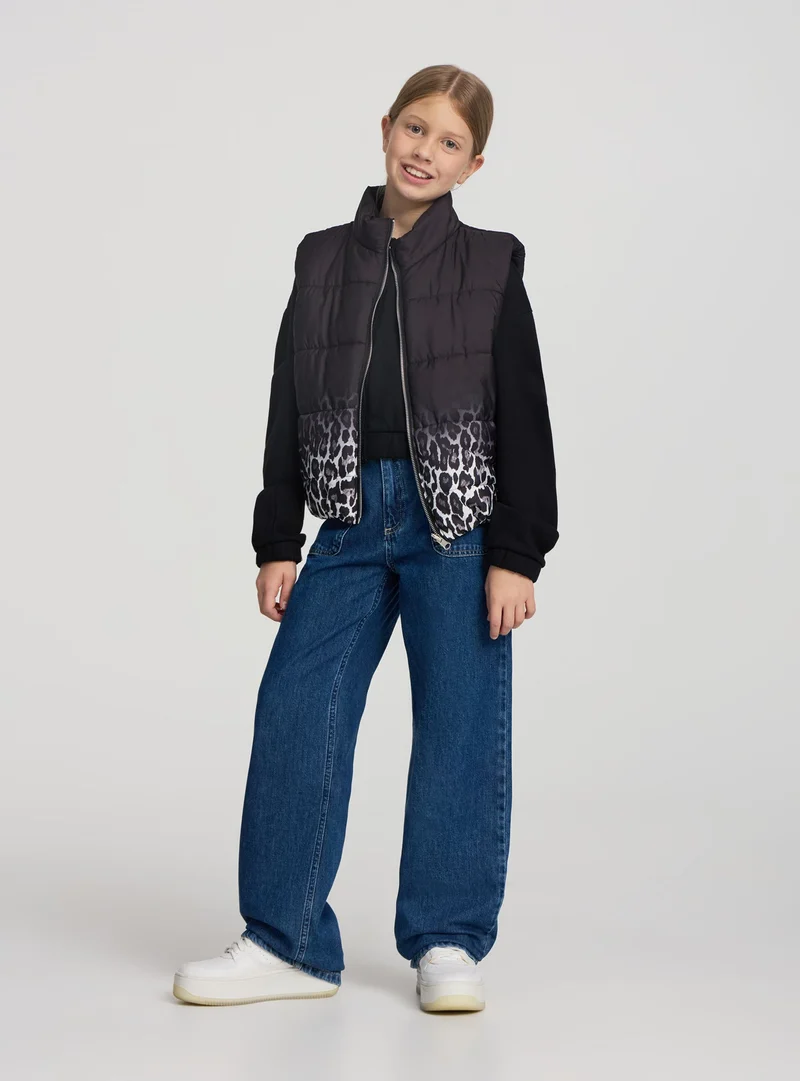 Jeans wide leg con tasche a patta