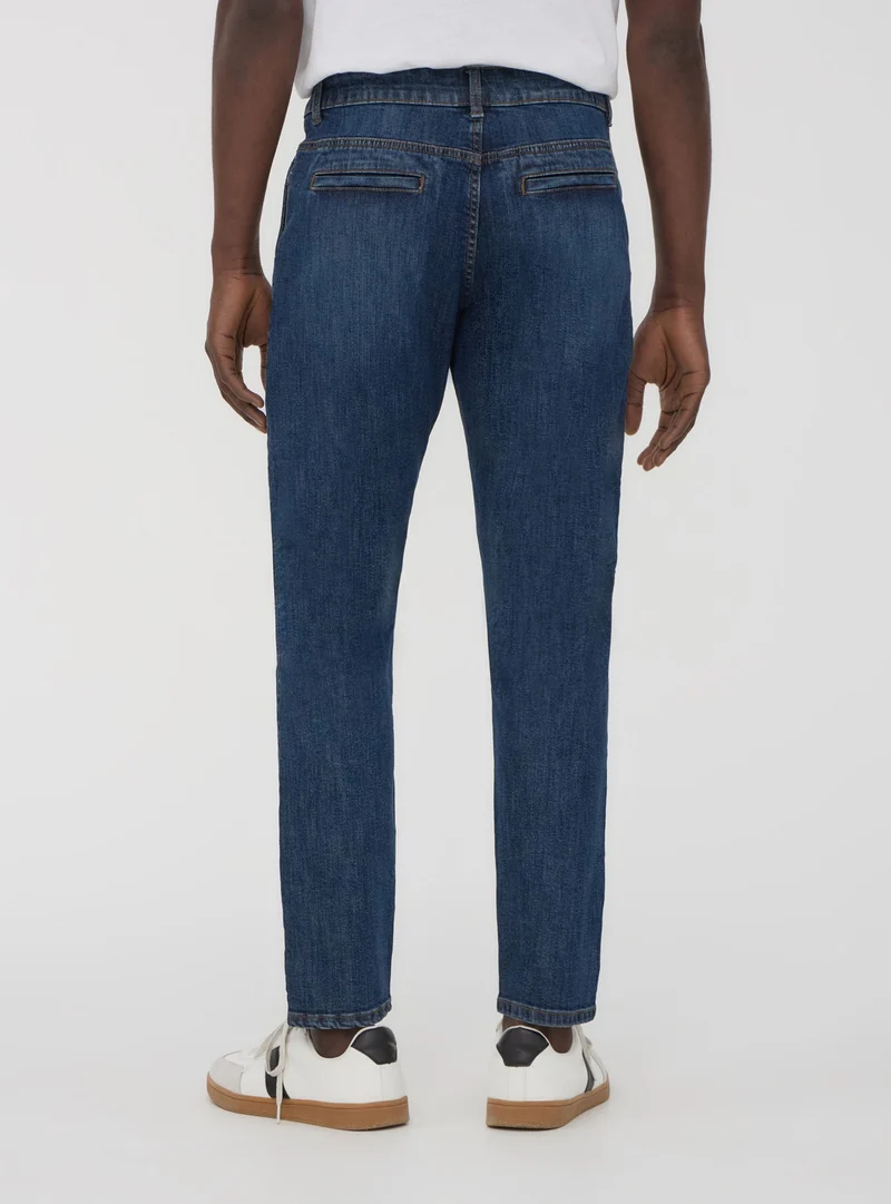Jeans scuri skinny chino