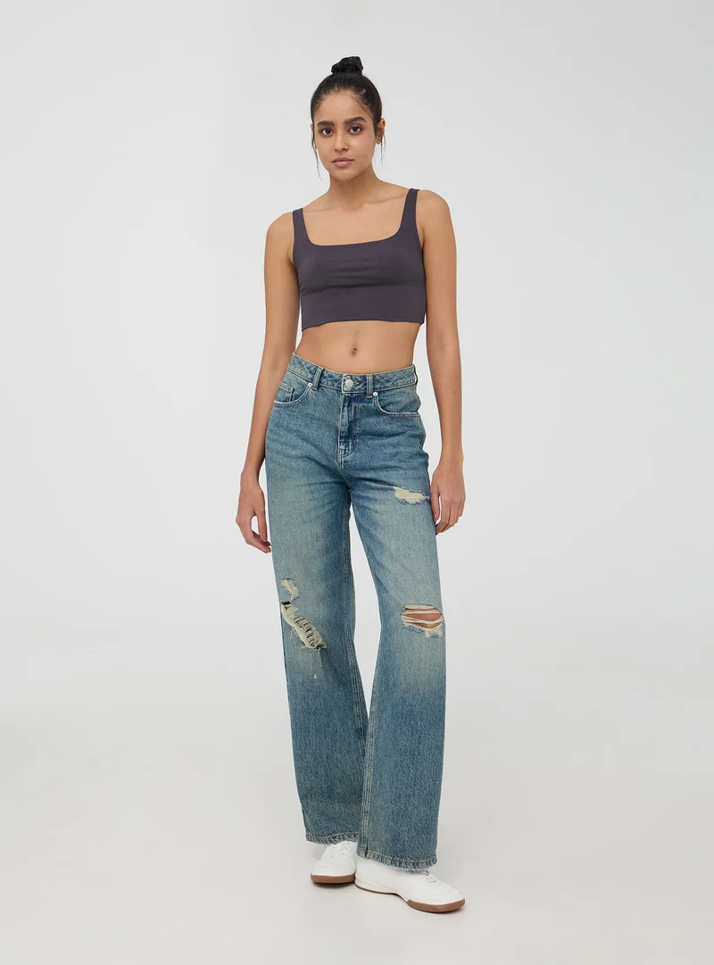 Jeans wide leg con strappi