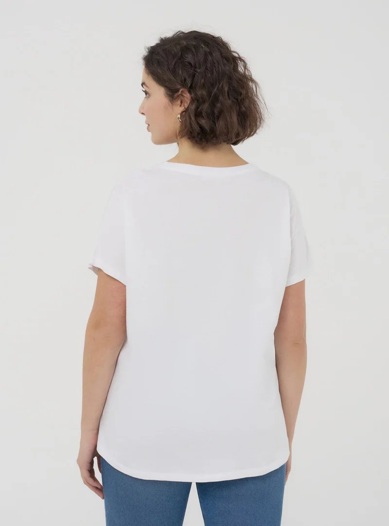 T-shirt tinta unita ampia