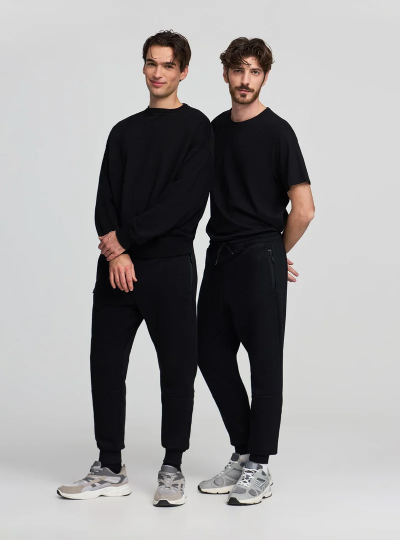 Pack 2 pantaloni tuta con zip