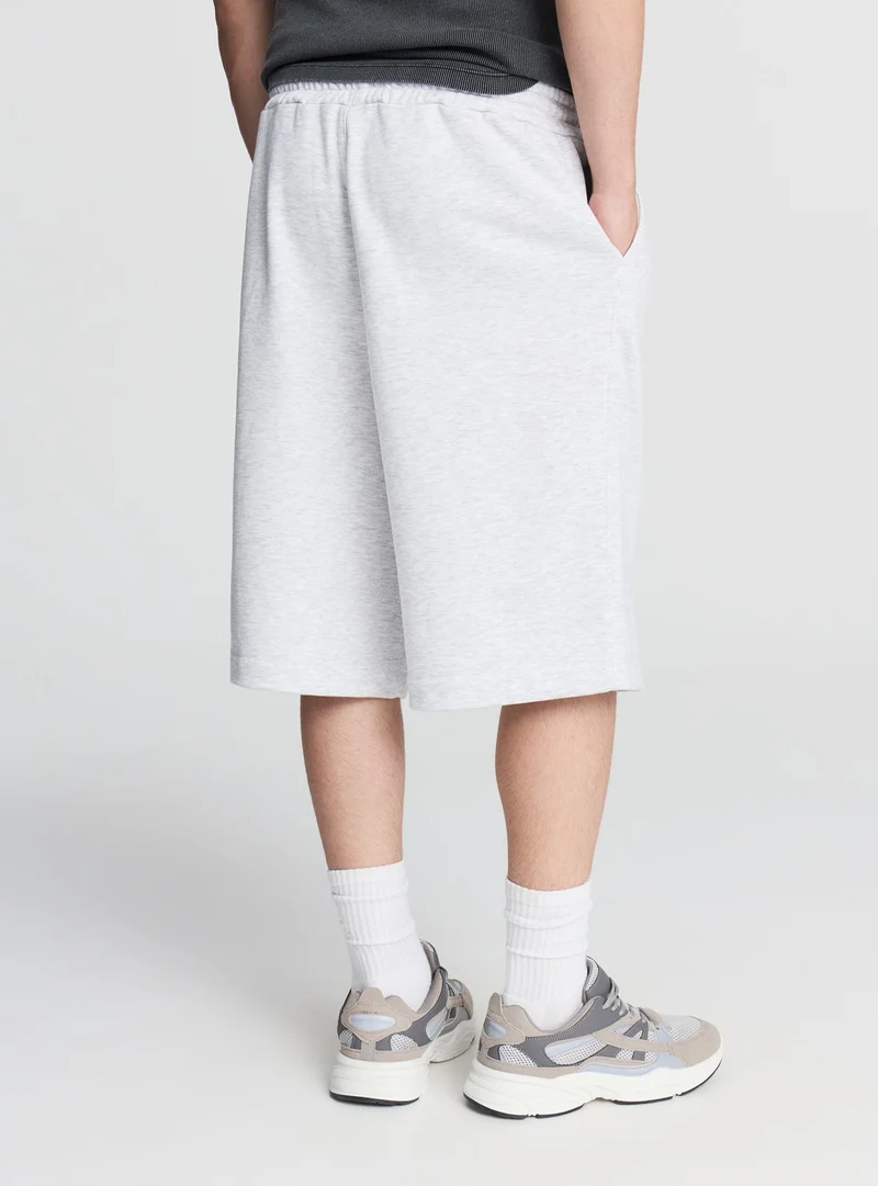 Pantaloncini tuta baggy con coulisse