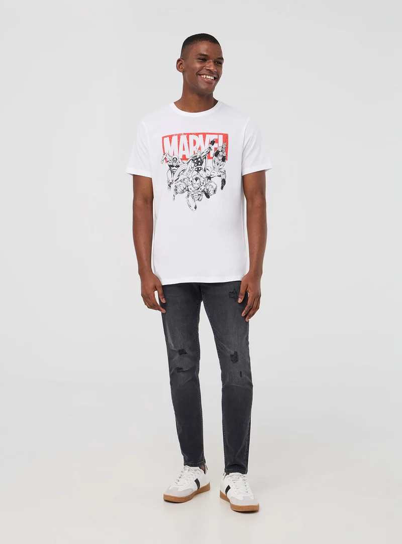 Jeans skinny con strappi piccoli