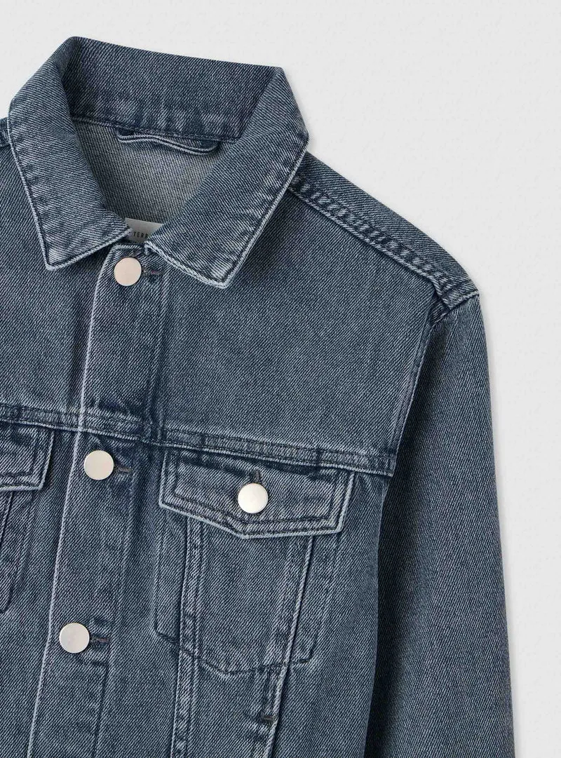 Giubbotto in denim con scritta