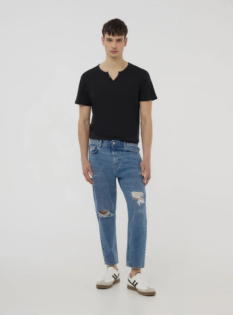 Jeans con strappi loose fit