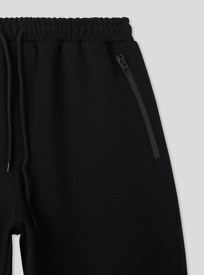 Pantaloncini tecnici tasche con zip