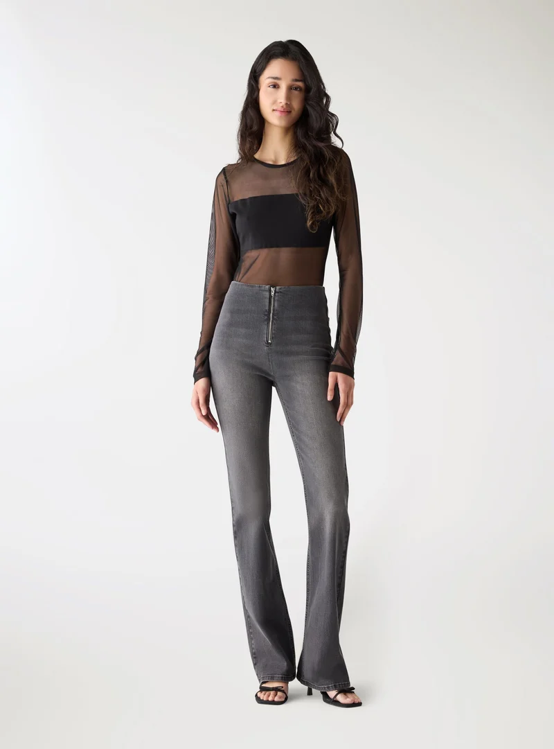 Jeans flared a vita bassa con zip