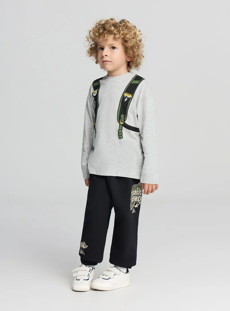 Pantaloni tuta con stampa graffiti