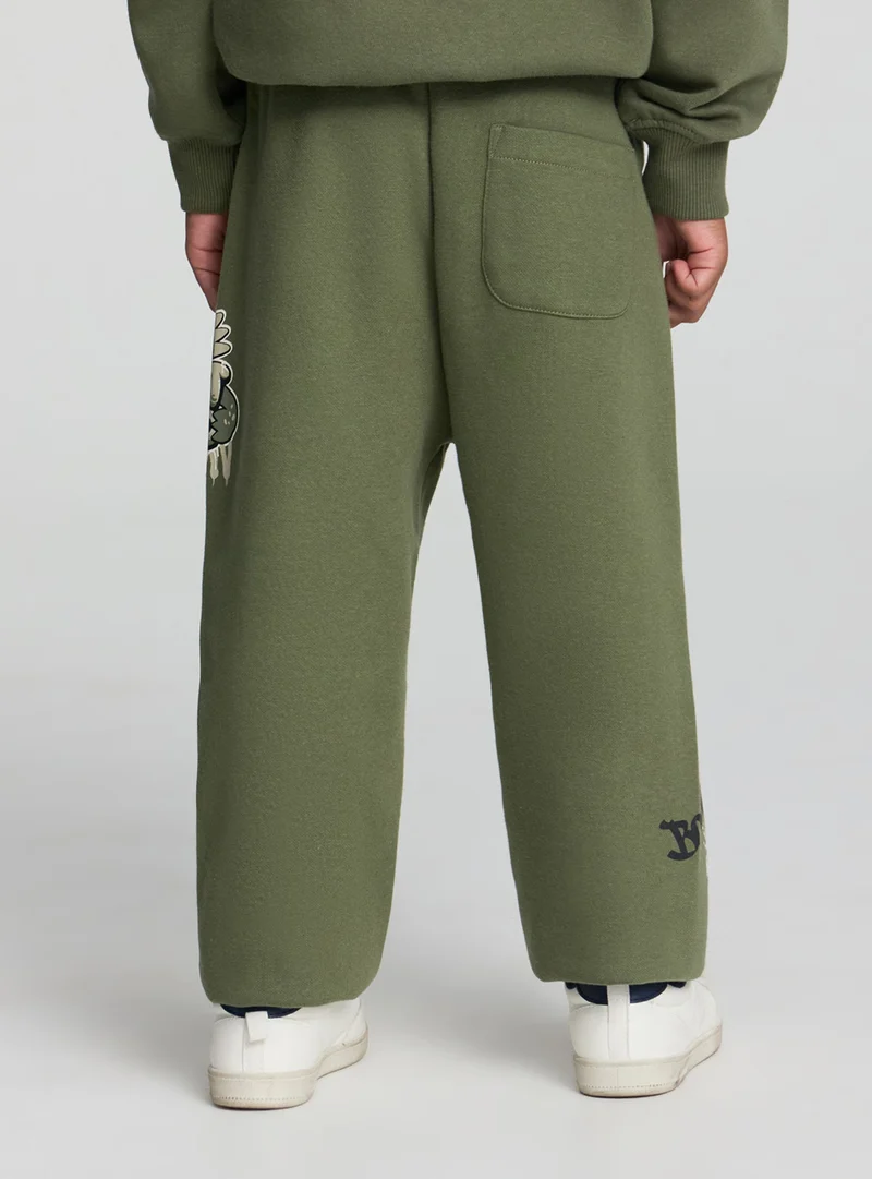 Pantaloni tuta con stampa graffiti