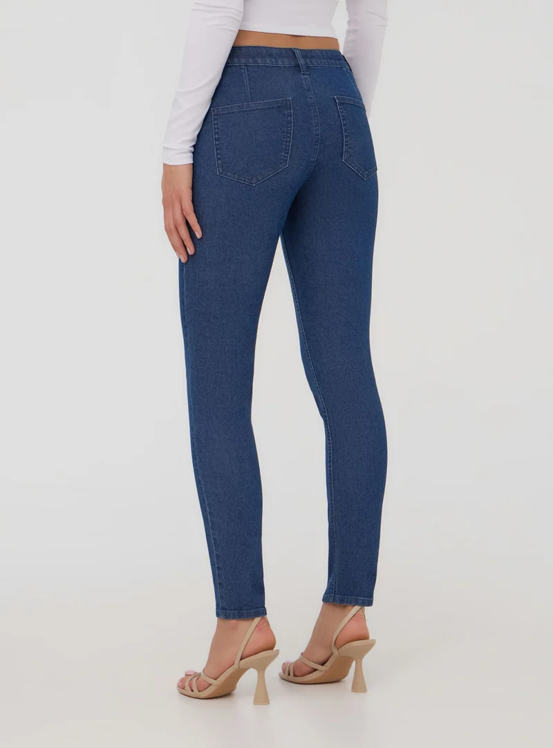 Jeggings scuri tinta unita