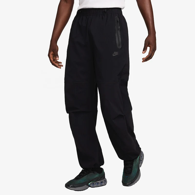 Nike Pantaloni oversize in tessuto – Uomo Tech