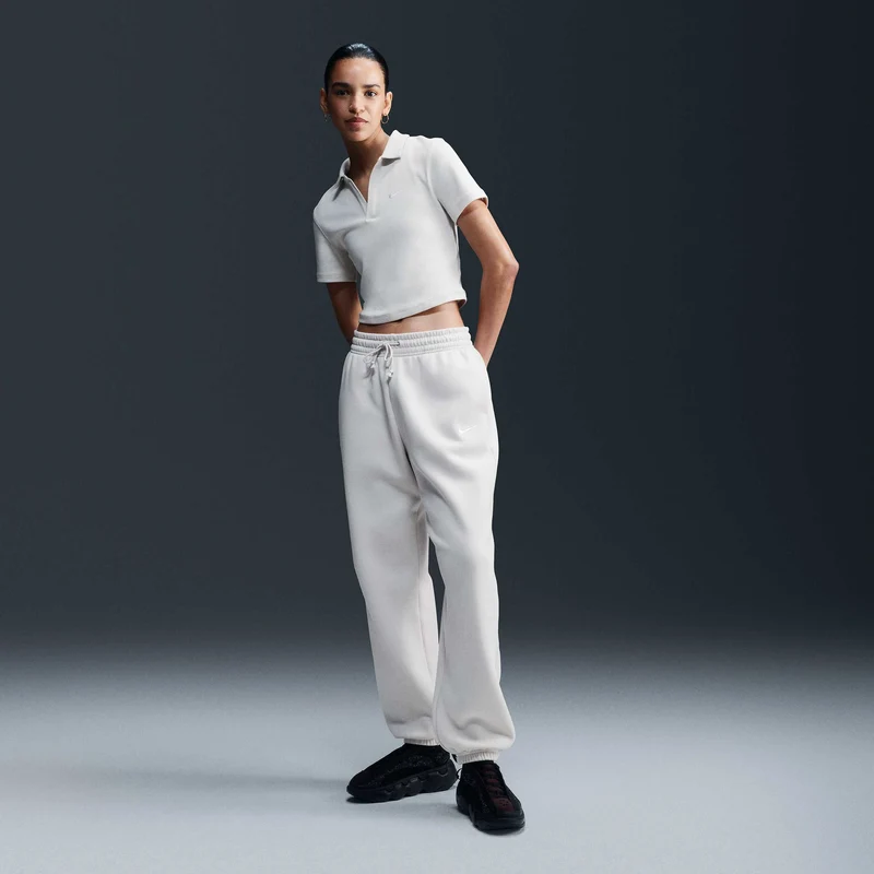 Nike Pantaloni tuta oversize a vita alta – Donna Sportswear